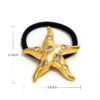 colet estrella dorada_perlas